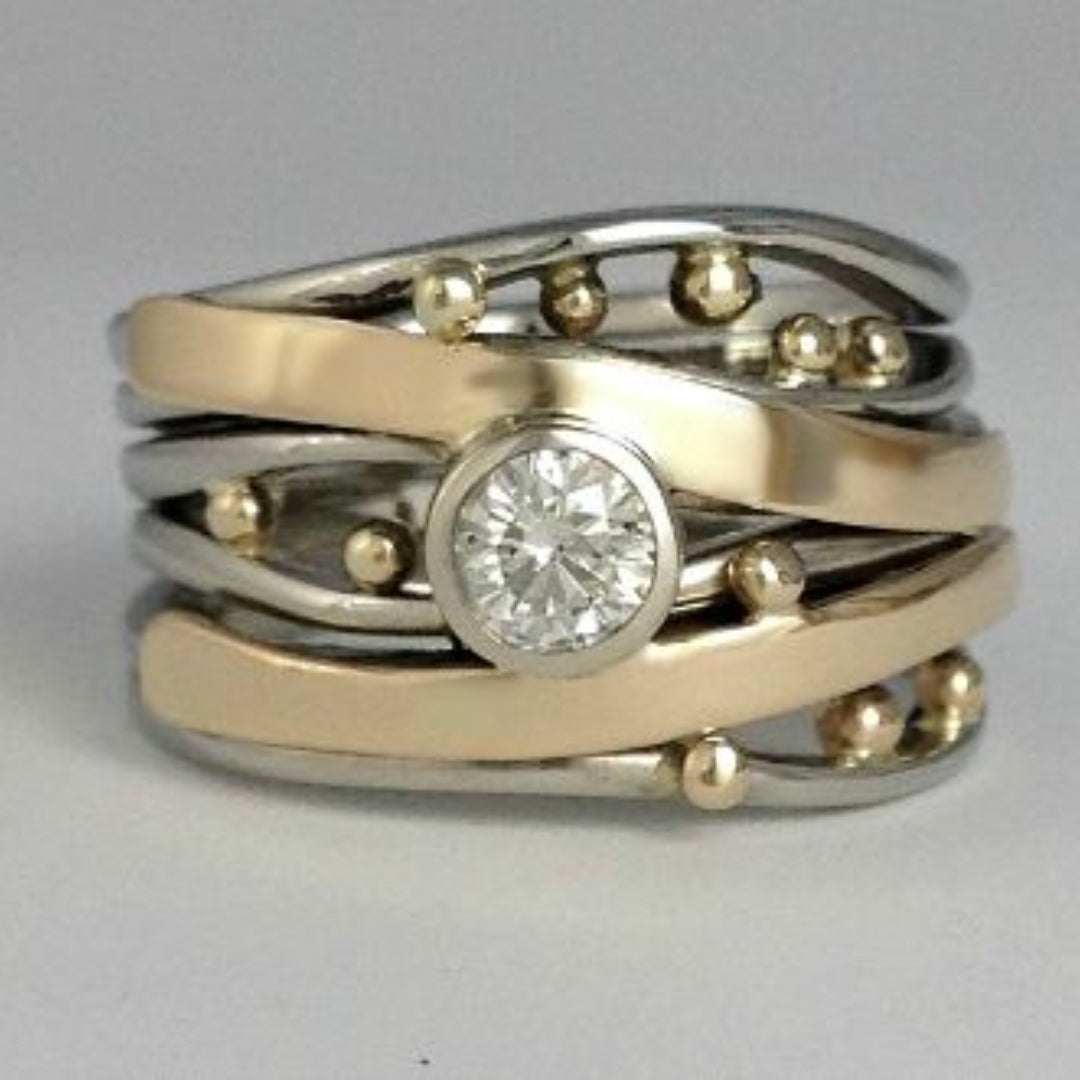 Bague en Or et Argent Ornée d’un Zircon